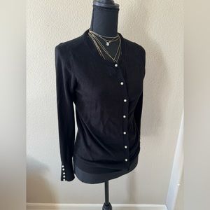 Black Zara cardigan with pearls.
